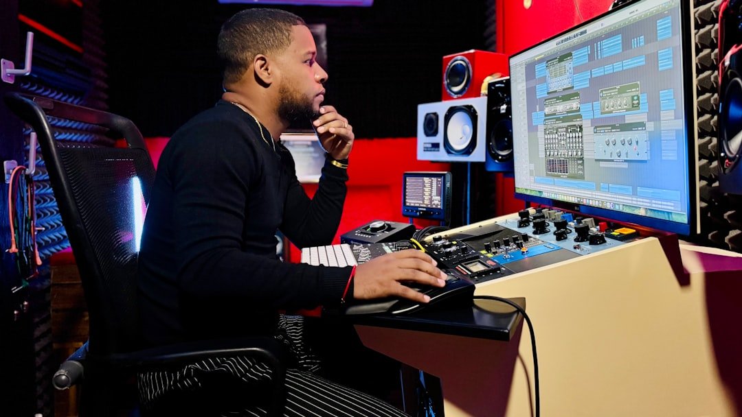 Music producer choosing bass sounds using reference tracks