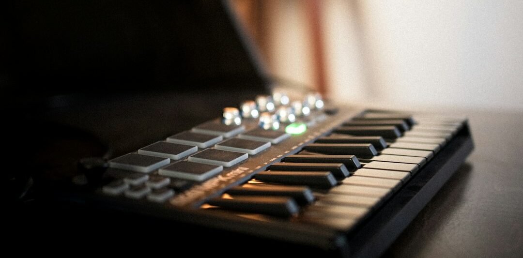 A keyboard sitting on top of a wooden table